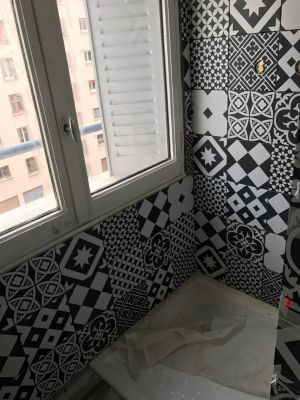 Mise en place de la faïence des douches